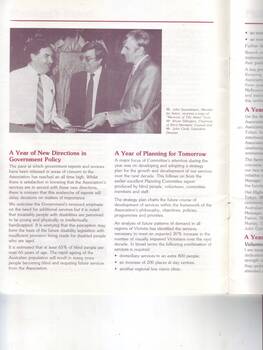 John Sanderson receives a book from Bryan Sitlington and John Cook
