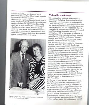 Hon. Caroline Hogg cuts a cake with Arthur Wilkins