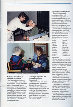 Male placing headphones over elderly man with monitors in foreground.  Female holds the hand of an elderly female as she teachers how to dial a telephone by touch.