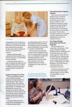 Woman holds the hand of an elderly resident.  Mary Longman prepares for a Italian tele-contact call at Kooyong.