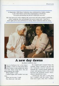 Sister Catherine Jess holds the hand of another woman as they speak.