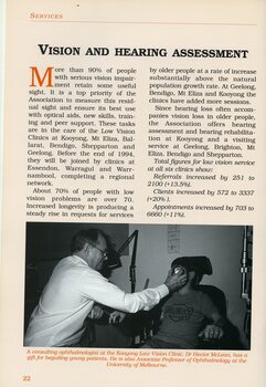 Dr Hector McLean at work with a young boy during a consultation.