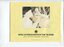Older woman in black fur hat weaving at a centre