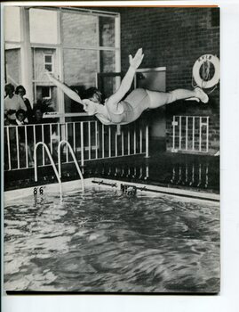 Robyn gracefully swan dives into the pool at Burwood