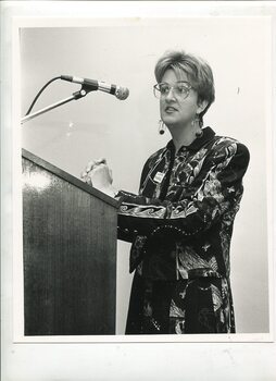 Judith Salles at the podium during the ceremony