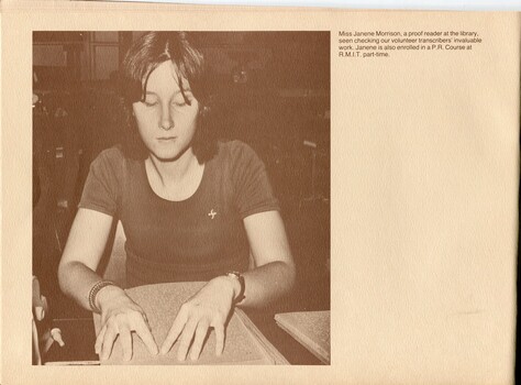Janene Morrison proof reading a Braille volume