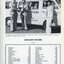 Auxiliary members present a cheque to AFB staff, while a mini-bus of members looks on