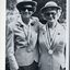 Gloria Pascoe and Edna Wratten with their Olympic medals dressed in team jackets and hats