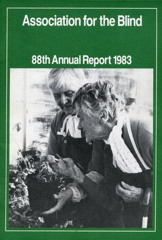 Two elderly woman, one holds a pot whilst another puts her hand under the leaves of a plant