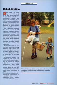 Denise Claringbould crosses a playground with her toddler and young child, shopping bags and a white cane.
