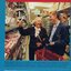 Loy Lancaster is assisted by her grand-daughter Denise Hamblin in the supermarket.