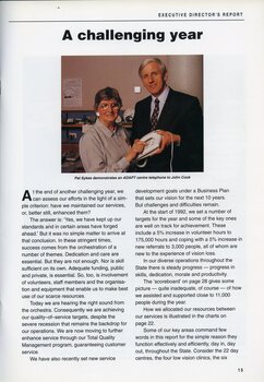 Pat Sykes and John Cook with an ADAPT centre telephone.