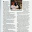 Robin Pleydell with Margaret Shanahan, as she reads Braille at a desk surrounded by keyboards and braillers.