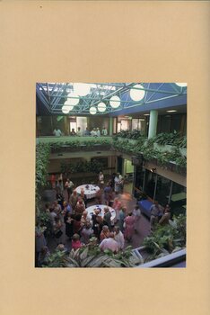 View from 1st floor of the atrium at Kooyong, filled with people.