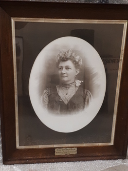 Portrait of woman with lace collar and later 19th century dress