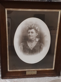 Portrait of woman with lace collar and later 19th century dress
