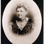 Portrait of woman with lace collar and later 19th century dress