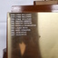 Names inscribed upon the base of the trophy