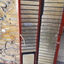 Fold out piece with metal plates brailled with country information