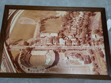 Aerial photograph of Kooyong tennis centre, grounds of the AFB, Malvern sporting grounds and Kooyong train line