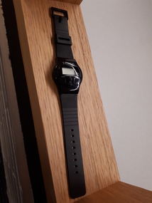 Black watch with LCD display and large buttons