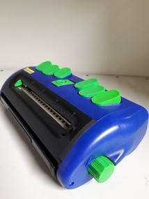 Blue rectangular shaped device with bright green buttons