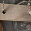 Metal plaque attached to firescreen