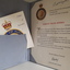 Folder with letter and three booklets