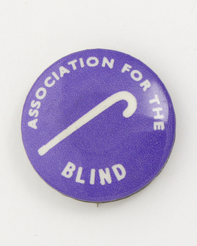 White cane image on purple background