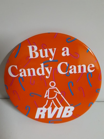 Large badge with orange background and white writing