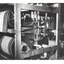 Man operating weaving machine for continuous matting