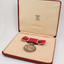 1 silver medal with rose pink and grey ribbon
