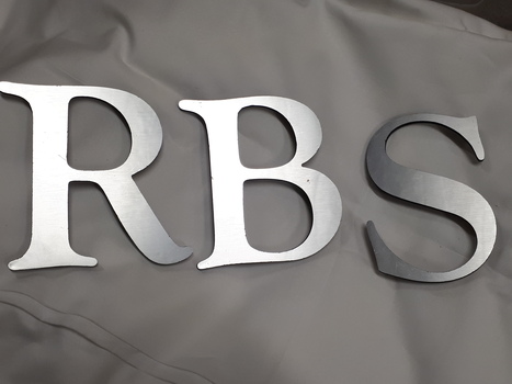 Silver coloured plastic letters that spell out Royal Blind Society 