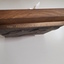 1986 Association for the Blind inscribed on top facing edge