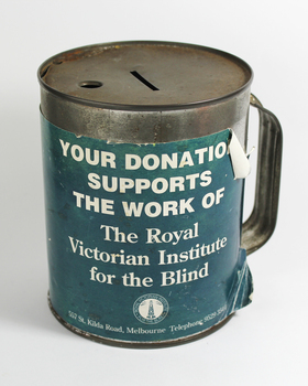Round tin with holder and paper wrapper