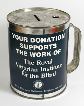 Round tin with holder and paper wrapper