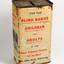 Rectangular tin with paper label badly damaged