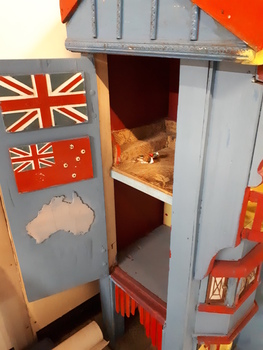 Wooden dolls house with doors.