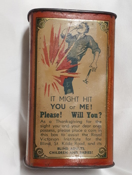 Metal rectangular box with images and writing printed on side
