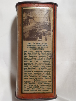 Metal rectangular box with images and writing printed on side