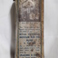 Metal rectangular box with images and writing printed on side