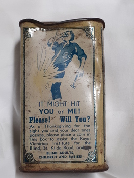 Metal rectangular box with images and writing printed on side