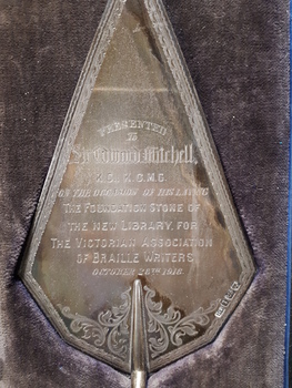 Close up of words engraved on trowel
