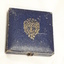 Blue square medal box with gold decoration