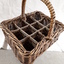 Cane basket with handle and dividers to carry milk bottles