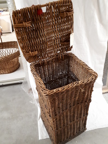 Tall rectangular basket made from cane