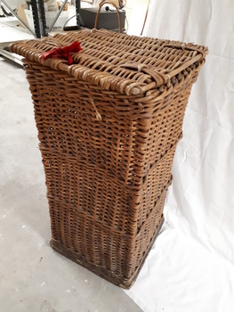 Tall rectangular basket made from cane
