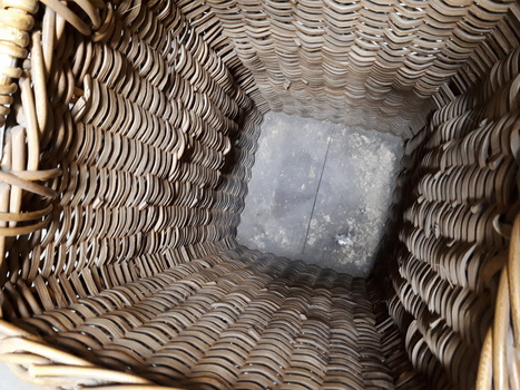 Tall rectangular basket made from cane