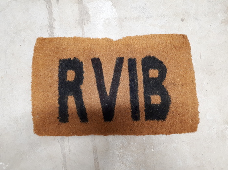 Printed bristle floor mat made by RVIB workers