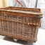 Large wicker basket on wheels